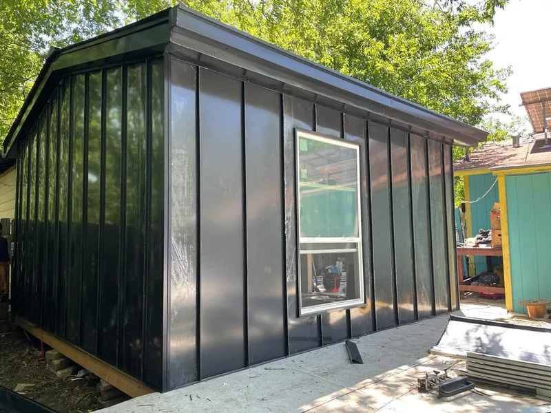 Black standing seam metal wall panels for Metal Roof Installation in Bellefonte