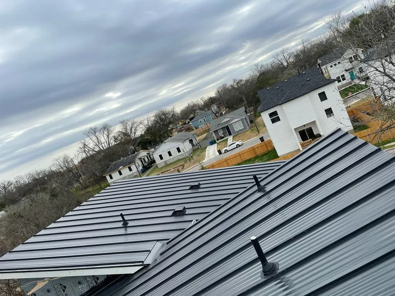 Standing seam metal roof panels with vents for Skylight Repair in Bellefonte